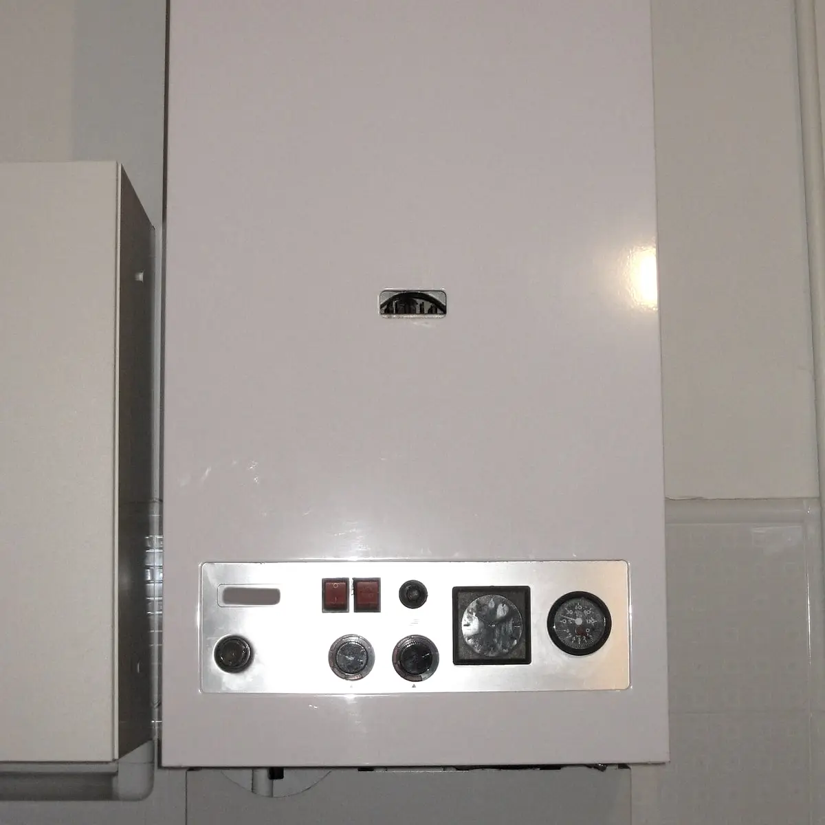 A wall-mounted tankless water heater